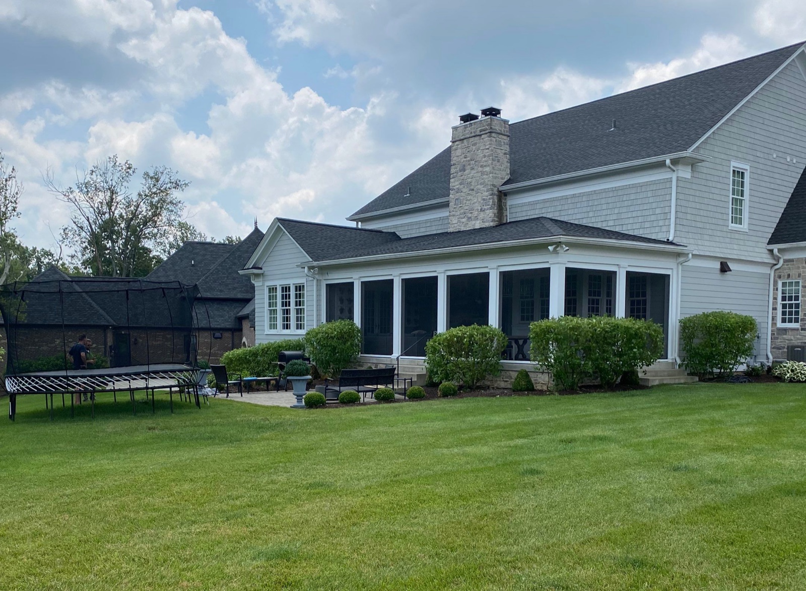 The original backyard &mdash; a small concrete patio that never matched the home.
